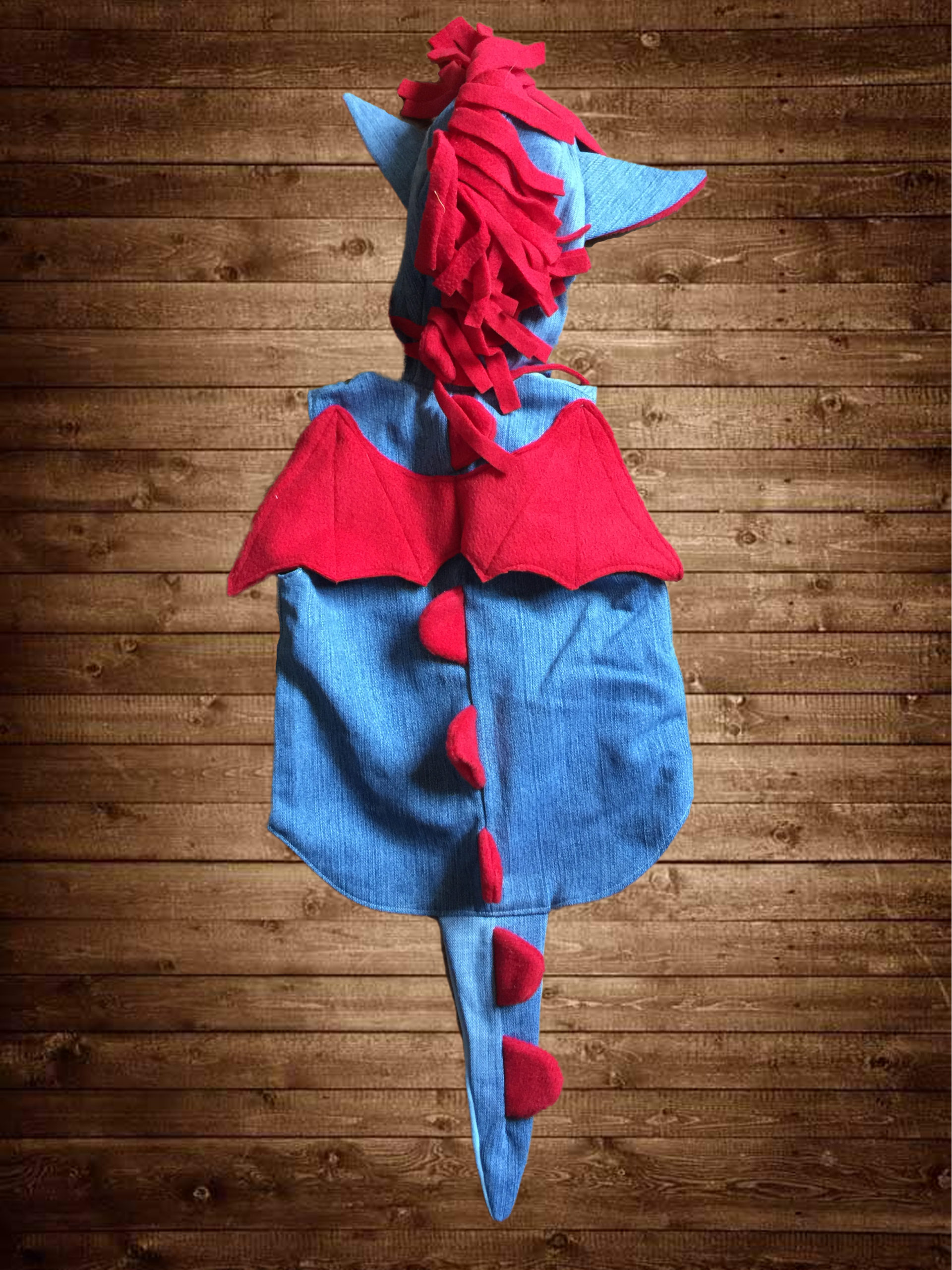 dragon back A hooded waist coat designed to look like a dragon!