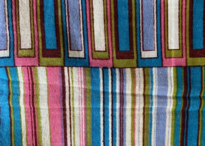 pink white blue and green linear pattern