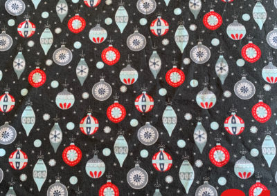 christmas baubles on grey